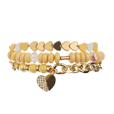 A meia metade amarela brilhante da corrente perla o bracelete com o pendente do coração do amor do zircão do ouro 14k