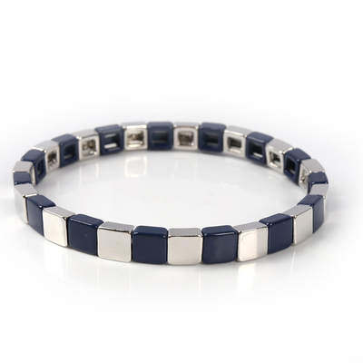 O bracelete geométrico da telha do esmalte, estiramento multicolorido perlou braceletes