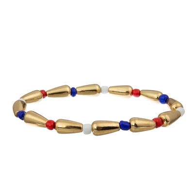 A semente feito a mão do Dia da Independência perla o elástico do grupo do bracelete colorido